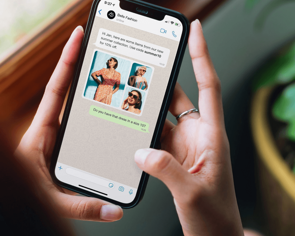 Woman holding a mobile phone and looking at a message